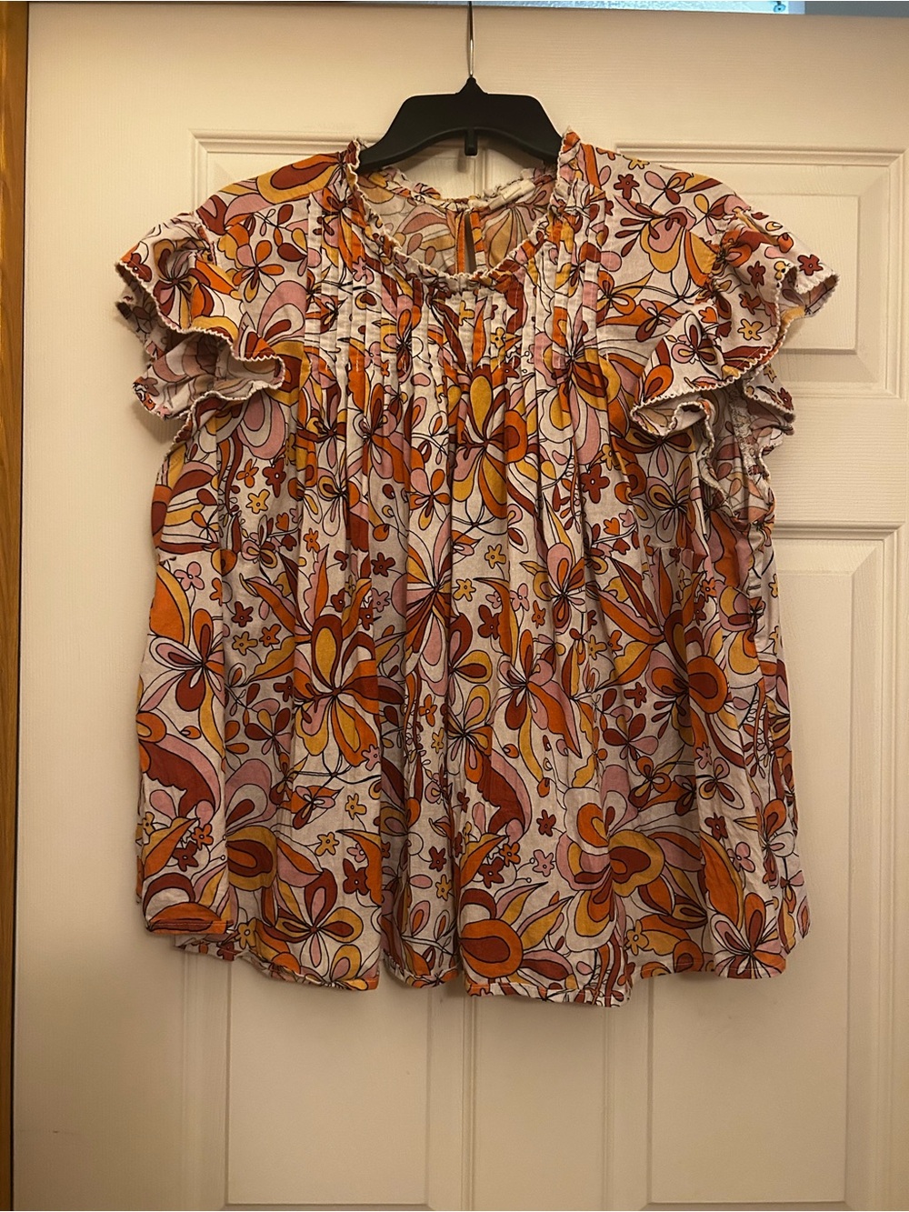 Women’s high-neck floral blouse